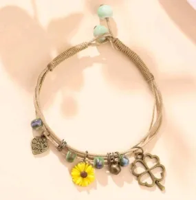 Jewellery - Bracelet - bronze blue yellow flower charm